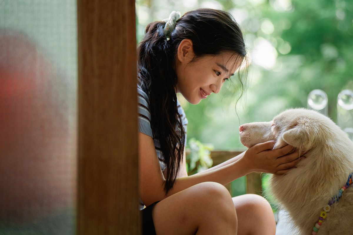 A girl cradling Gohan's face