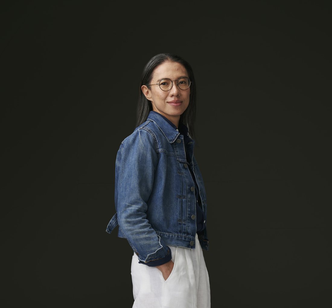 Portrait of Vanridee Pongsittisak in a denim jacket
